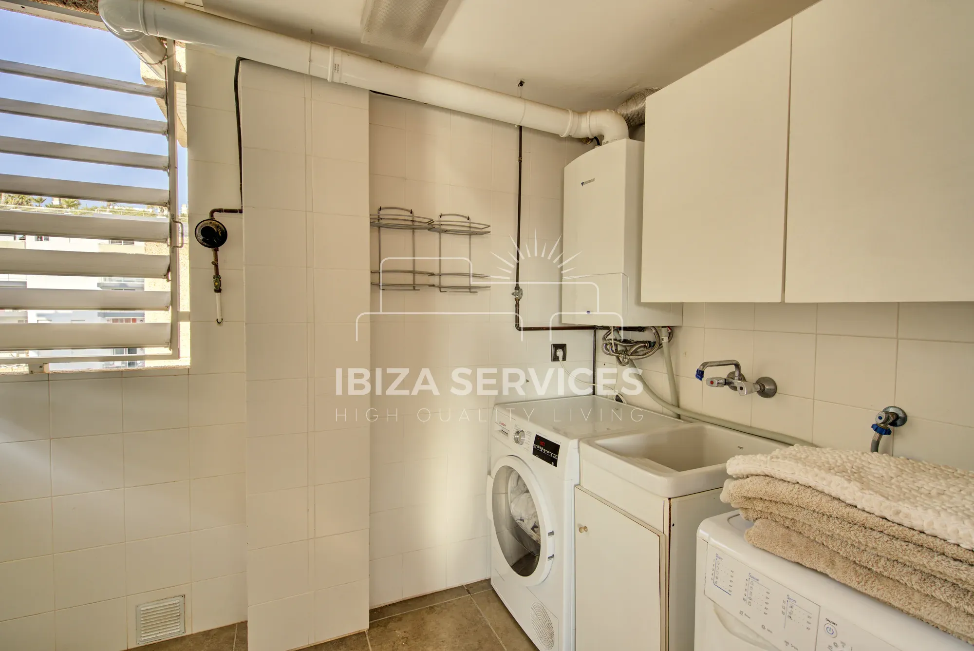 Buy a luxury 5 bedroom apartment in Ibiza Building front line